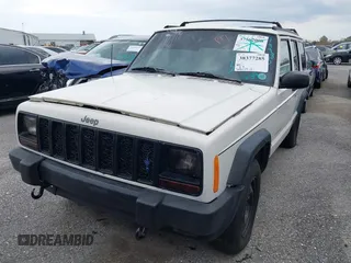 1998 Jeep Cherokee Sport with VIN 1J4FT68S5WL199283, listed as a IAAI auction lot 38377285 with 208,074 mi miles. Bid and sale history available at carsss.com. Image 6.