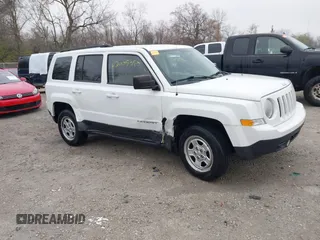 2014 Jeep Patriot Sport with VIN 1C4NJRBB1ED744101, listed as a IAAI auction lot 42009390 with 180,214 mi miles. Bid and sale history available at carsss.com. Image 14.