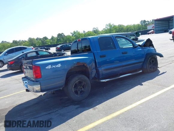 2005 Dodge Dakota SLT with VIN 1D7HW48N05S319621, listed as a IAAI auction lot 42037140 with 251,595 mi miles and . Bid and sale history available at DreamBid. Image 4.