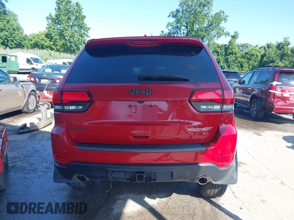 2021 Jeep Grand Cherokee Trailhawk with VIN 1C4RJFLG8MC549403, listed as a IAAI auction lot 42538177 with 33,124 mi miles and . Bid and sale history available at DreamBid. Image 16.
