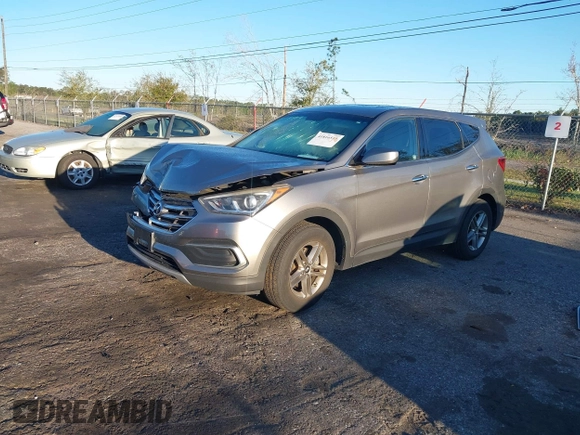 2018 Hyundai Santa Fe 2.4L z VIN 5NMZTDLB8JH098926, wystawiony jako IAAI lot #41816513 z przebiegiem 92 920 mil mil oraz . Historia ofert i sprzedaży dostępna na DreamBid. Obrazek 2.