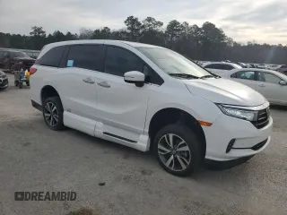 2021 Honda Odyssey Touring z VIN 5FNRL6H83MB041063, wystawiony jako Copart lot #48914835 z przebiegiem 23 556 mil mil oraz Szkoda całkowita • Salvage title. Historia ofert i sprzedaży dostępna na DreamBid. Obrazek 4.