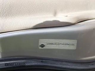 1997 Nissan Altima XE with VIN 1N4BU31D7VC254106, listed as a IAAI auction lot 41787644 with 145,106 mi miles. Bid and sale history available at carsss.com. Image 9.