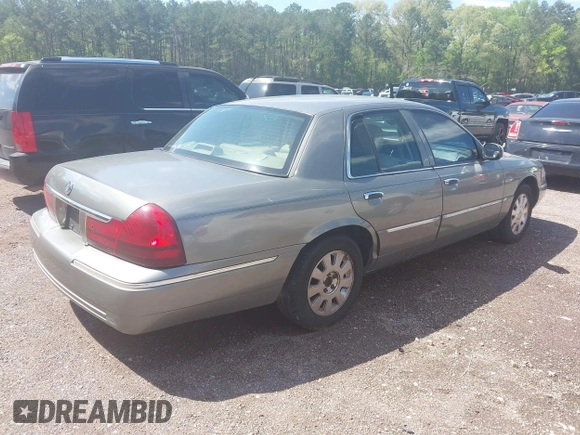 2003 Mercury Grand Marquis LS Premium z VIN 2MEFM75W53X691700, wystawiony jako IAAI lot #41952048 z przebiegiem 208 747 mil mil oraz . Historia ofert i sprzedaży dostępna na DreamBid. Obrazek 4.