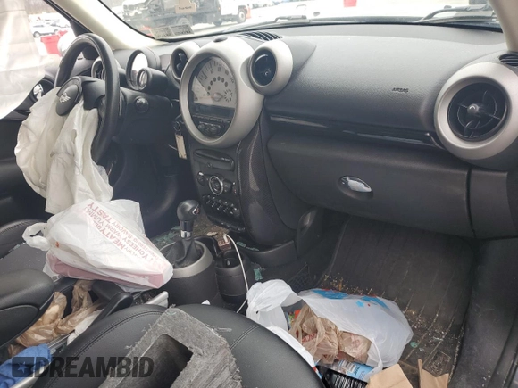 2012 MINI Countryman S with VIN WMWZC5C52CWL56578, listed as a Copart auction lot 51097735 with Not Provided miles and Salvage Title. Bid and sale history available at DreamBid. Image 8.