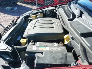 2014 Dodge Grand Caravan SXT 30th Anniversary with VIN 2C4RDGCG4ER335658, listed as a IAAI auction lot 43380204 with 129,746 mi miles and . Bid and sale history available at DreamBid. Image 12.