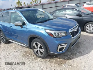 2020 Subaru Forester Touring with VIN JF2SKAXCXLH433924, listed as a IAAI auction lot 40693779 with 36,870 mi miles. Bid and sale history available at carsss.com. Image 1.