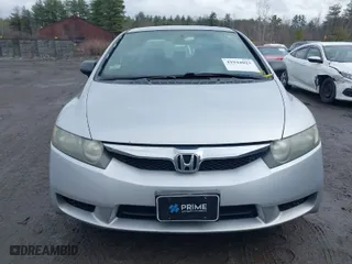 2010 Honda Civic Sdn DX-VP with VIN 2HGFA1F36AH585146, listed as a IAAI auction lot 41944023 with 130,079 mi miles. Bid and sale history available at carsss.com. Image 12.
