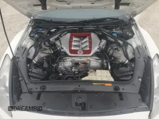 2015 Nissan GT-R Premium z VIN JN1AR5EF5FM281737, wystawiony jako Copart lot #80119804 z przebiegiem 50 726 mil mil oraz Szkody całkowita. Historia ofert i sprzedaży dostępna na DreamBid. Obrazek 11.
