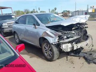2015 Lexus RX 450h with VIN 2T2ZB1BA7FC002089, listed as a IAAI auction lot 41826675 with 100,852 mi miles and . Bid and sale history available at DreamBid. Image 1.