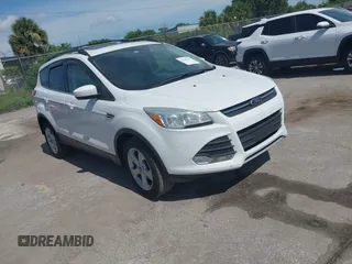 2013 Ford Escape SE with VIN 1FMCU0GX5DUA85464, listed as a IAAI auction lot 42701315 with 158,093 mi miles and . Bid and sale history available at DreamBid. Image 1.