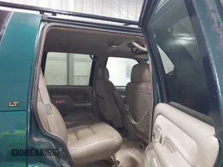 1996 Chevrolet Tahoe z VIN 1GNEK13R4TJ417000, wystawiony jako IAAI lot #41992121 z przebiegiem 166 215 mil mil oraz . Historia ofert i sprzedaży dostępna na DreamBid. Obrazek 8.