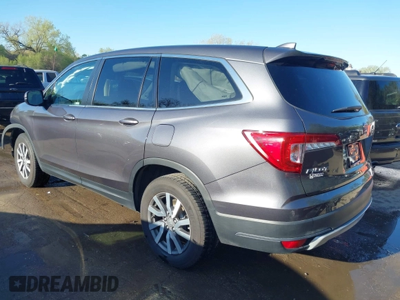 2019 Honda Pilot EX-L with VIN 5FNYF6H54KB038176, listed as a IAAI auction lot 42039560 with 52,404 mi miles and . Bid and sale history available at carsss.com. Image 3.