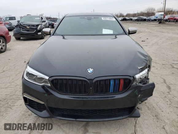 2018 BMW 5 Series M550i xDrive with VIN WBAJB9C56JB049524, listed as a Copart auction lot 43511805 with 55,759 mi miles and Salvage title. Bid and sale history available at DreamBid. Image 5.