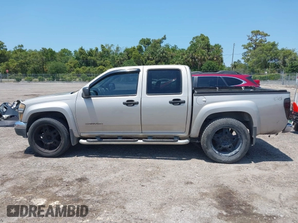 2005 GMC Canyon 1SF SLE Z71 z VIN 1GTDT136958143066, wystawiony jako IAAI lot #42191864 z przebiegiem 192 584 mil mil oraz . Historia ofert i sprzedaży dostępna na DreamBid. Obrazek 14.
