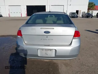 2009 Ford Focus S with VIN 1FAHP34N79W221813, listed as a IAAI auction lot 41758471 with 248,531 mi miles. Bid and sale history available at carsss.com. Image 16.