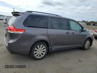 2012 Toyota Sienna XLE with VIN 5TDDK3DC2CS038316, listed as a Copart auction lot 52694245 with 273,415 mi miles and Clean Title. Bid and sale history available at DreamBid. Image 3.