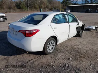 2019 Toyota Corolla L with VIN 5YFBURHEXKP934032, listed as a IAAI auction lot 41247557 with 95,560 mi miles. Bid and sale history available at carsss.com. Image 4.