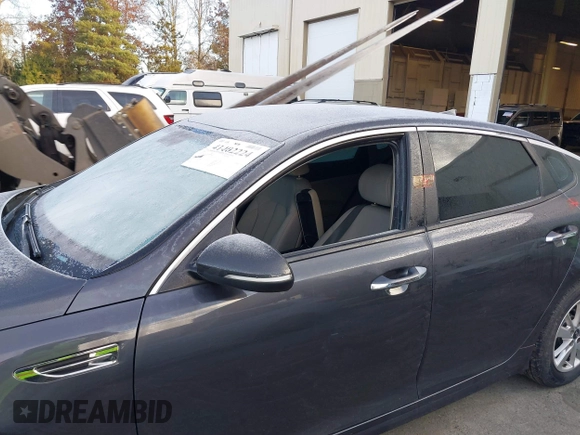 2017 Kia Optima LX with VIN 5XXGT4L32HG156845, listed as a IAAI auction lot 41402224 with 126,529 mi miles. Bid and sale history available at carsss.com. Image 6.
