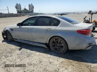 2020 BMW M5 z VIN WBSJF0C09LCE53241, wystawiony jako Copart lot #52607075 z przebiegiem Nie podano mil oraz Szkoda całkowita • Salvage title. Historia ofert i sprzedaży dostępna na DreamBid. Obrazek 2.