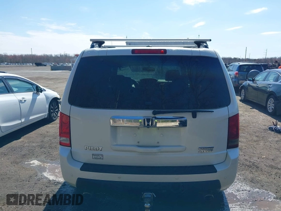2011 Honda Pilot Touring with VIN 5FNYF4H96BB014095, listed as a IAAI auction lot 41794052 with 202,440 mi miles and . Bid and sale history available at DreamBid. Image 16.