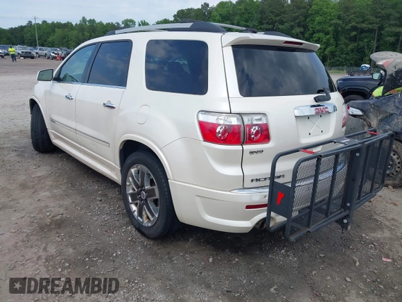 2012 GMC Acadia Denali with VIN 1GKKVTED5CJ197001, listed as a IAAI auction lot 42303383 with 211,958 mi miles and . Bid and sale history available at DreamBid. Image 3.