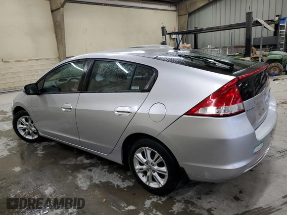 2010 Honda Insight EX with VIN JHMZE2H70AS037057, listed as a Copart auction lot 52704985 with 162,897 mi miles and Clean Title. Bid and sale history available at DreamBid. Image 2.