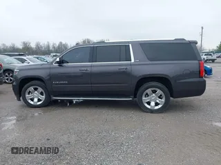 2015 Chevrolet Suburban LTZ with VIN 1GNSKKKC4FR712965, listed as a IAAI auction lot 41928053 with 188,571 mi miles. Bid and sale history available at carsss.com. Image 14.