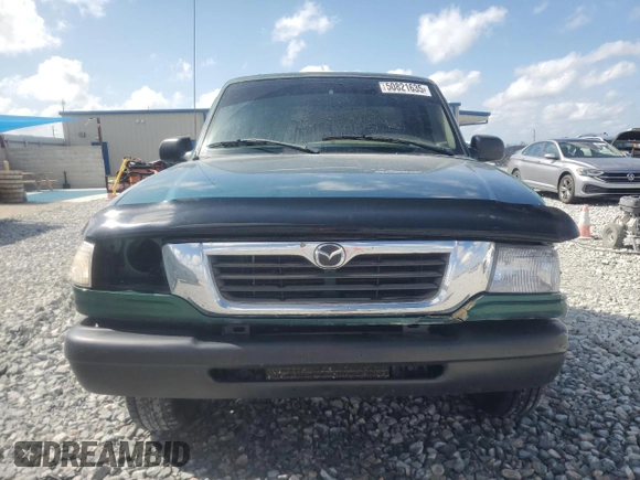 1999 Mazda B-Series Truck SX z VIN 4F4YR12CXXTM34917, wystawiony jako Copart lot #50821635 z przebiegiem 121 165 mil mil oraz Szkoda całkowita • Salvage title. Historia ofert i sprzedaży dostępna na DreamBid. Obrazek 5.