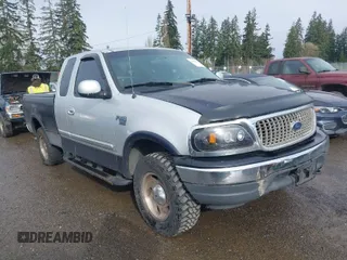 2000 Ford F-150 XL with VIN 1FTRX18L8YKA72409, listed as a IAAI auction lot 41928360 with 167,251 mi miles. Bid and sale history available at carsss.com. Image 1.