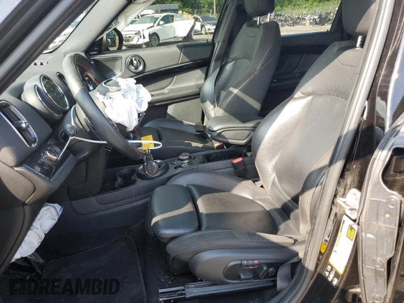 2019 MINI Countryman John Cooper Works with VIN WMZYV9C5XK3F02695, listed as a Copart auction lot 63736285 with 82,706 mi miles and Salvage title. Bid and sale history available at DreamBid. Image 7.