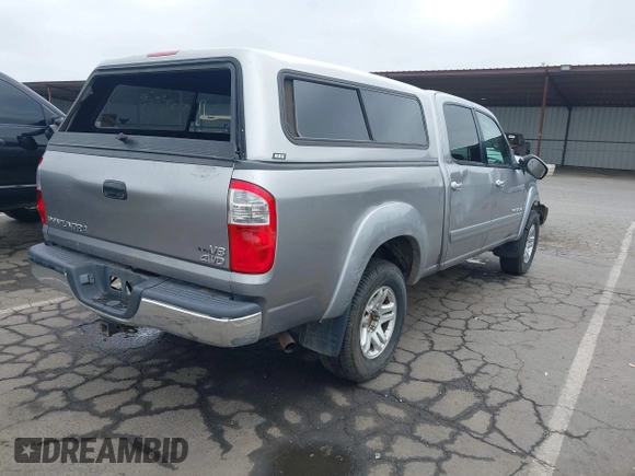 2005 Toyota Tundra SR5 with VIN 5TBDT441X5S479169, listed as a IAAI auction lot 42058790 with 323,936 mi miles and . Bid and sale history available at DreamBid. Image 4.