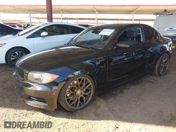 2008 BMW 1 Series 135i with VIN WBAUC73538VF25755, listed as a IAAI auction lot 42121984 with 147,513 mi miles. Bid and sale history available at carsss.com. Image 2.