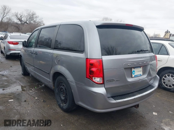 2014 Dodge Grand Caravan American Value with VIN 2C4RDGBG9ER187198, listed as a IAAI auction lot 41669334 with 204,803 mi miles and . Bid and sale history available at DreamBid. Image 3.
