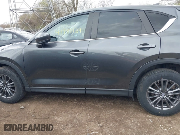2020 Mazda CX-5 Touring with VIN JM3KFBCM1L0792396, listed as a IAAI auction lot 41949124 with 118,280 mi miles. Bid and sale history available at carsss.com. Image 14.