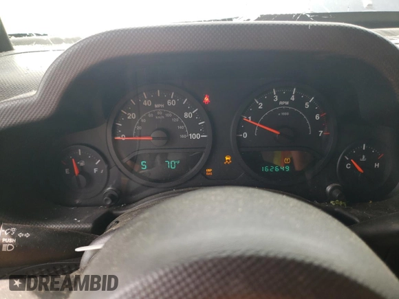 2008 Jeep Wrangler X with VIN 1J4FA24158L563572, listed as a Copart auction lot 58667265 with 162,649 mi miles and Salvage title. Bid and sale history available at DreamBid. Image 9.