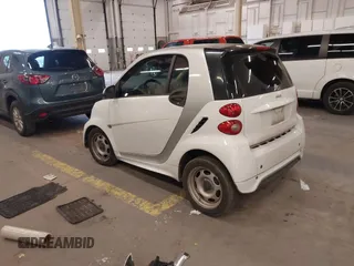 2015 Smart fortwo Passion with VIN WMEEJ3BA1FK805997, listed as a IAAI auction lot 41900723 with 102,185 mi miles. Bid and sale history available at carsss.com. Image 3.