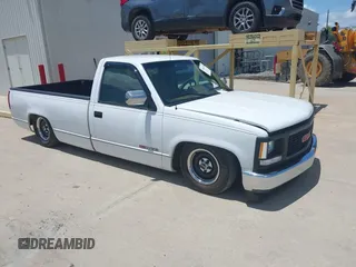1994 GMC Sierra 1500 z VIN 1GTFC24KXRE522028, wystawiony jako IAAI lot #42463380 z przebiegiem 153 411 mil mil oraz . Historia ofert i sprzedaży dostępna na DreamBid. Obrazek 1.