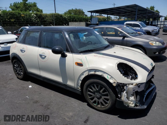2017 MINI Hardtop 4 Door Cooper with VIN WMWXU1C32H2F77790, listed as a Copart auction lot 62352415 with 71,661 mi miles and Salvage title. Bid and sale history available at DreamBid. Image 4.