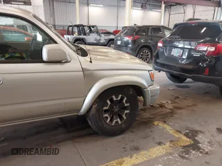 2000 Toyota 4Runner SR5 z VIN JT3HN86R6Y0294870, wystawiony jako IAAI lot #42131835 z przebiegiem 292 259 mil mil oraz . Historia ofert i sprzedaży dostępna na DreamBid. Obrazek 13.
