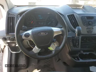 2016 Ford Transit Cargo z VIN 1FTYE1YM3GKB18575, wystawiony jako IAAI lot #42734024 z przebiegiem 186 138 mil mil oraz . Historia ofert i sprzedaży dostępna na DreamBid. Obrazek 22.