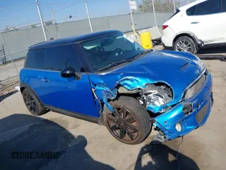 2010 MINI Hardtop S with VIN WMWMF7C51ATZ71215, listed as a IAAI auction lot 40451459 with 104,402 mi miles and . Bid and sale history available at DreamBid. Image 1.