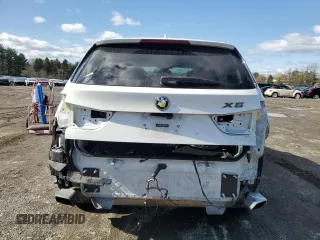 2018 BMW X5 xDrive35i with VIN 5UXKR0C53J0X93705, listed as a Copart auction lot 51715435 with 106,677 mi miles and Salvage Title. Bid and sale history available at carsss.com. Image 6.