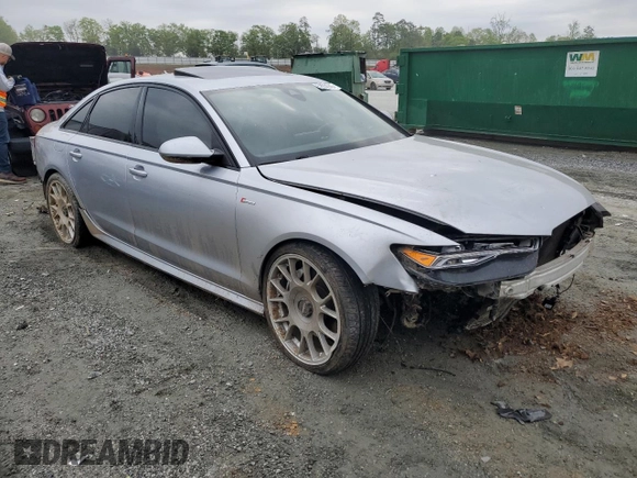 2016 Audi A6 Prestige with VIN WAUHGAFC2GN063620, listed as a Copart auction lot 52552945 with 203,877 mi miles and Salvage title. Bid and sale history available at DreamBid. Image 4.