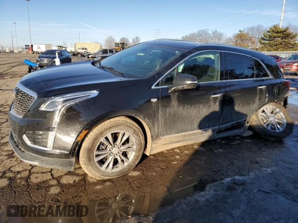 2021 Cadillac XT5 AWD Premium Luxury with VIN 1GYKNDRS6MZ111640, listed as a Copart auction lot 46567035 with 57,484 mi miles and Salvage Title. Bid and sale history available at DreamBid. Image 1.