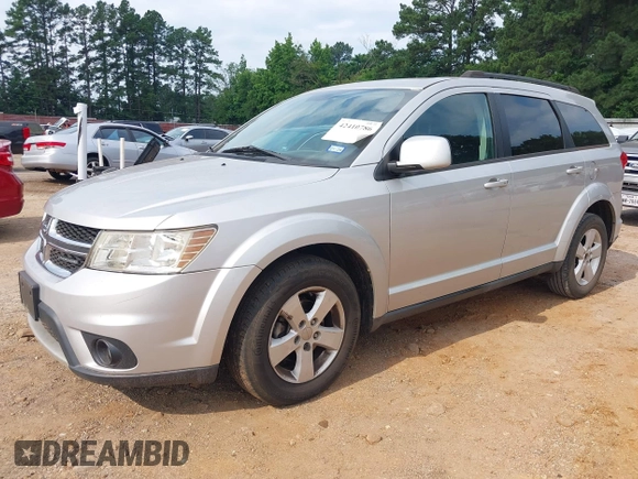 2012 Dodge Journey SXT z VIN 3C4PDCBG4CT189046, wystawiony jako IAAI lot #42410786 z przebiegiem 147 928 mil mil oraz . Historia ofert i sprzedaży dostępna na DreamBid. Obrazek 2.