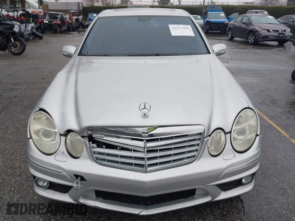 2003 Mercedes-Benz E-Class 5.5L AMG with VIN WDBUF76J93A351317, listed as a IAAI auction lot 41573446 with 144,119 mi miles. Bid and sale history available at carsss.com. Image 12.