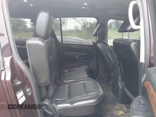 2014 Nissan Armada SL z VIN 5N1BA0NC8EN601509, wystawiony jako IAAI lot #42420782 z przebiegiem 131 717 mil mil oraz . Historia ofert i sprzedaży dostępna na DreamBid. Obrazek 8.