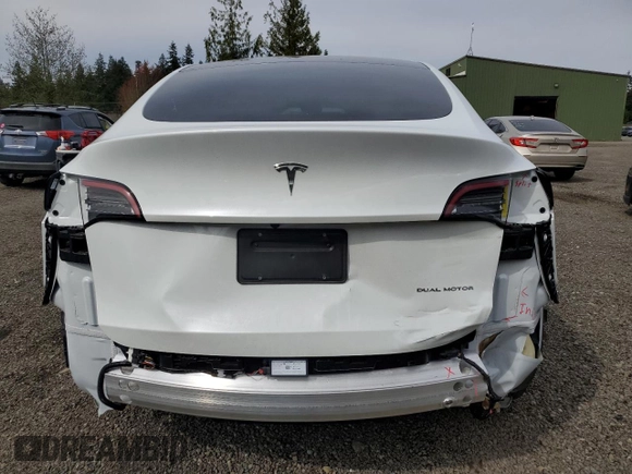 2023 Tesla Model Y Long Range with VIN 7SAYGDEE6PA101291, listed as a Copart auction lot 52758115 with 7,250 mi miles and Salvage Title. Bid and sale history available at DreamBid. Image 6.
