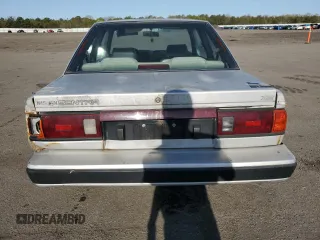 1990 Nissan Sentra z VIN 1N4GB22B7LC773110, wystawiony jako Copart lot #55384855 z przebiegiem 48 159 mil mil oraz Tytuł czysty. Historia ofert i sprzedaży dostępna na DreamBid. Obrazek 6.